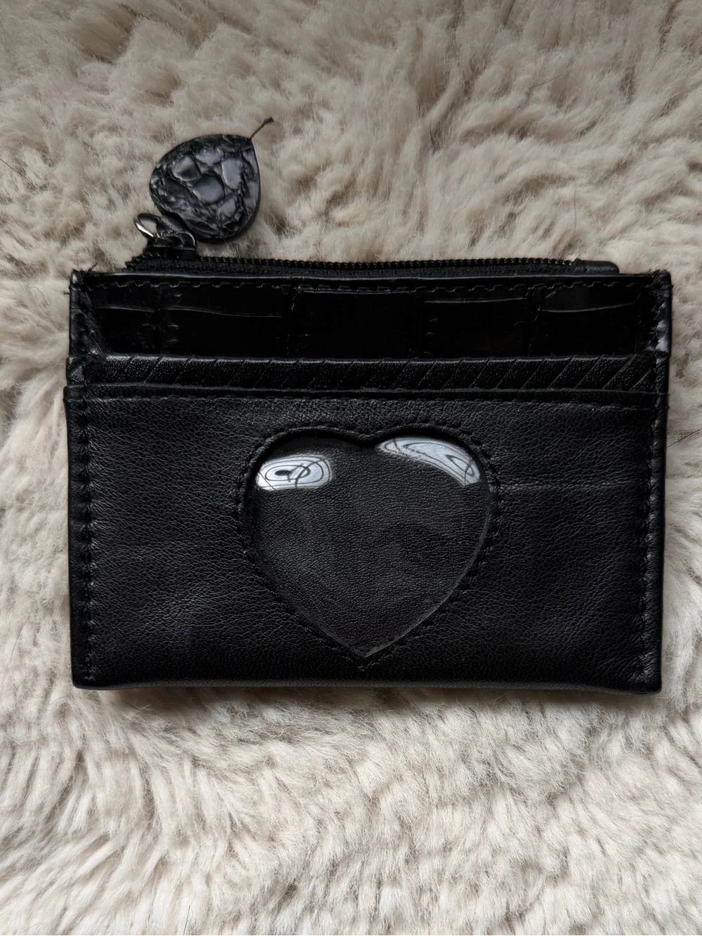 Brighton small black leather wallet featuring a heart-shaped photo slot